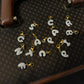 CHARM LETTERA ZIRCONI