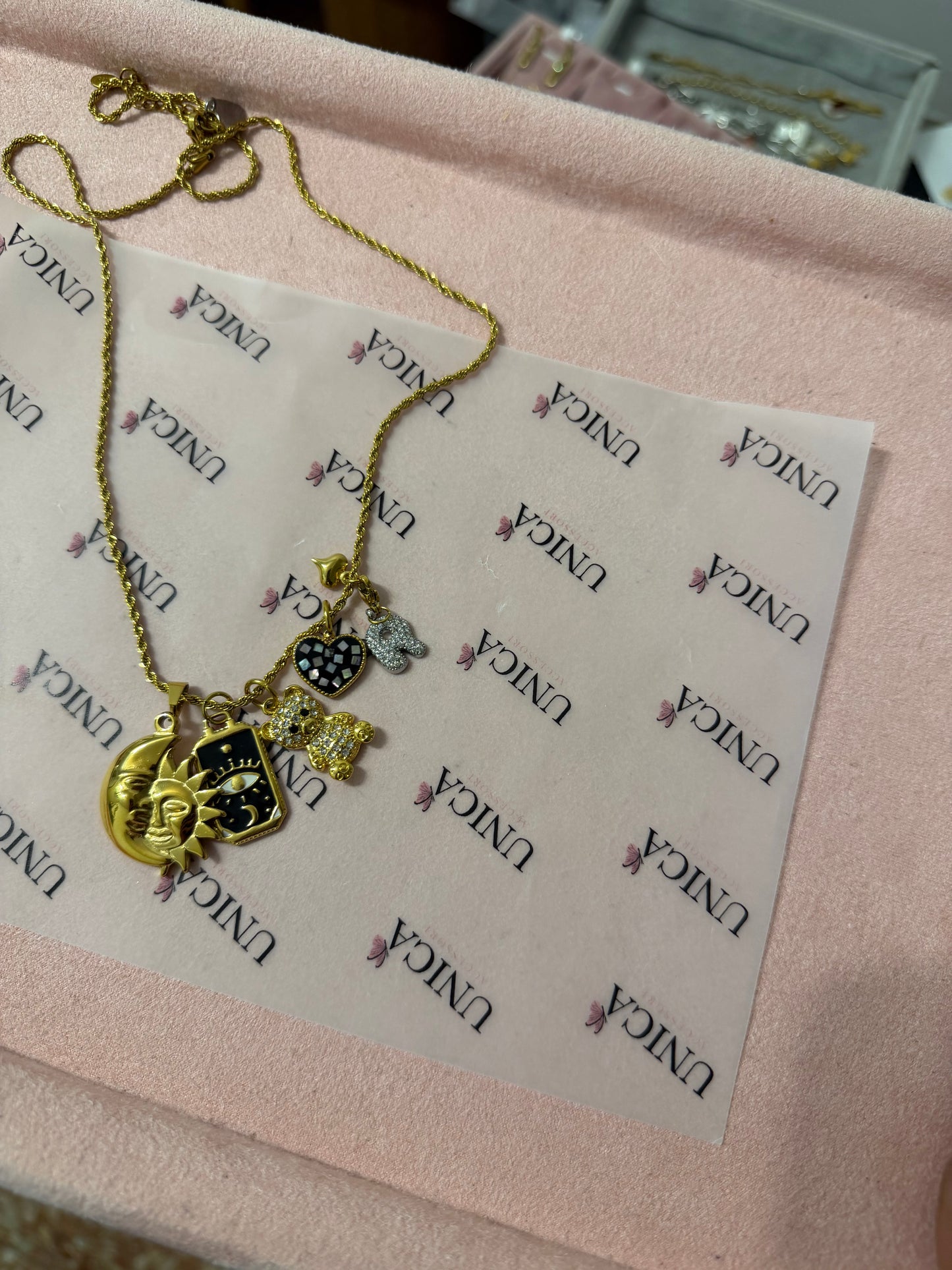 CHARM LETTERA ZIRCONI