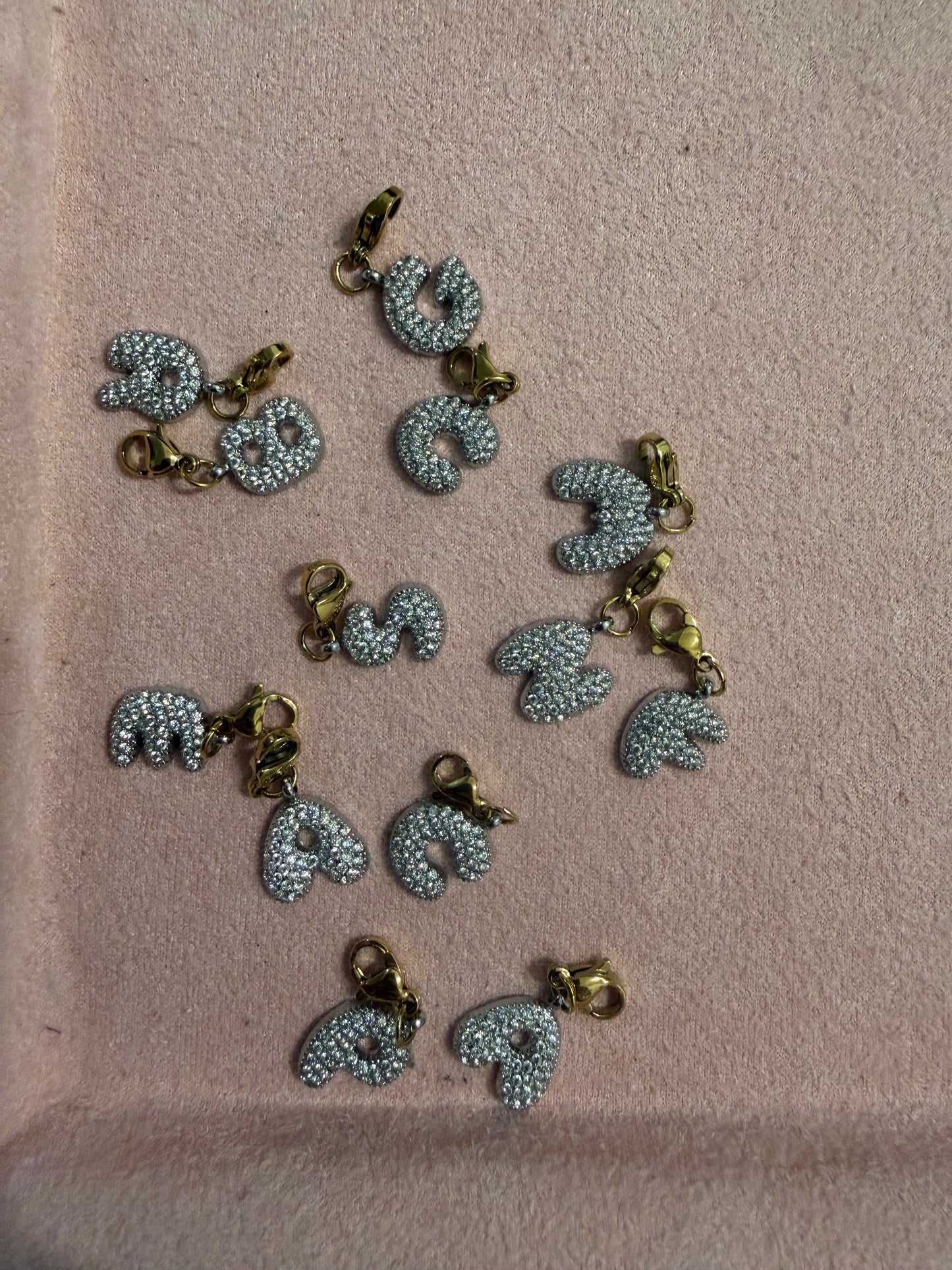 CHARM LETTERA ZIRCONI